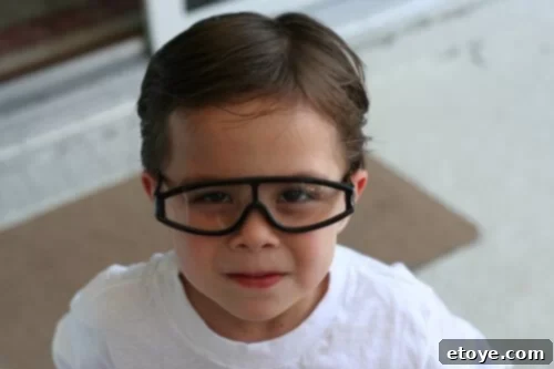 Hard-Won Happiness 3 Andrew wearing playful goggles