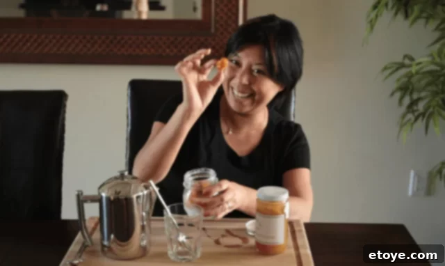 Chinese Salted Kumquat Preserve 2 jaden holding salted kumquat