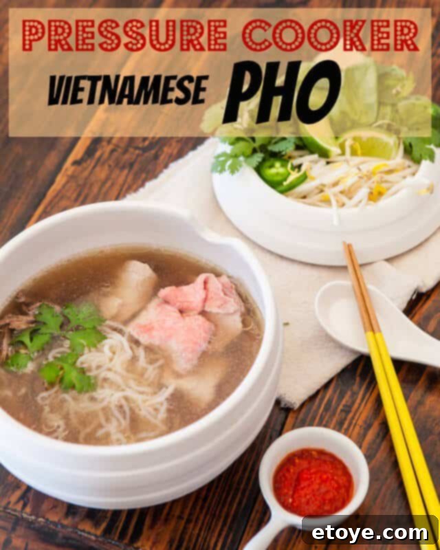 A vibrant bowl of homemade Pressure Cooker Pho, showcasing fresh herbs and tender beef slices.