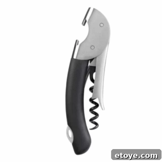 Close-up of OXO Double Lever Waiter's Corkscrew, highlighting its ergonomic soft-grip handle and dual-lever mechanism