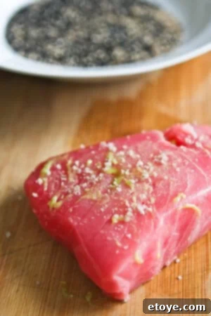 Sesame Seared Tuna with Lime Ginger Vinaigrette -step-003 Sesame Seared Tuna step 3: Season with salt and pepper