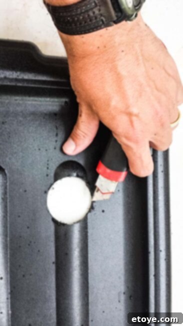 Trimming Plastic Burrs from Drilled Holes