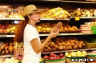 Win a South Beach Miami Food Tour 4 An expert guide explaining the Malanga root, a staple ingredient in Caribbean and Latin American cuisine, to an attentive group.