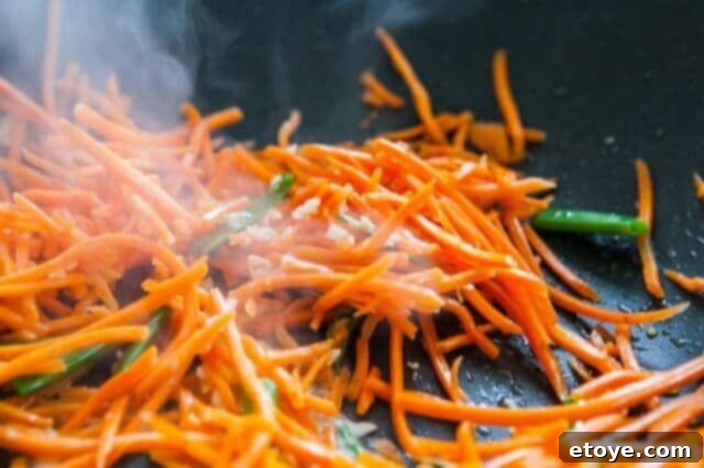 Low-Carb Pad Thai Zoodles 10 Carrots in Wok for Pad Thai Zoodles