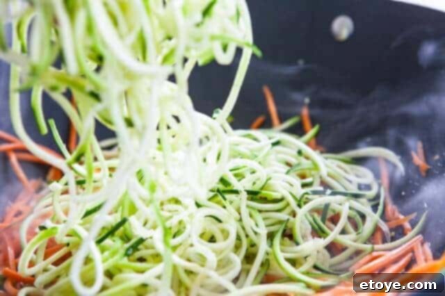 Low-Carb Pad Thai Zoodles 11 Zucchini Zoodles in Wok for Pad Thai Zoodles