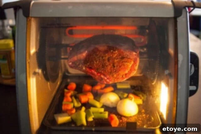 Prime Rib Roast Recipe - Rotisserie in action Rotisserie in action, cooking a prime rib roast
