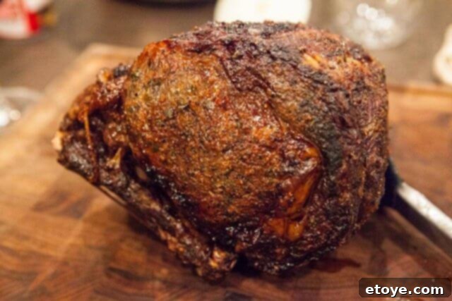 Prime Rib Roast Recipe - Resting Resting Prime Rib Roast on a cutting board