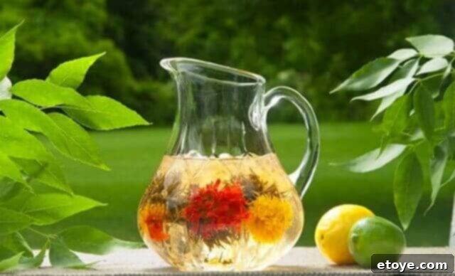 Tea Beyond Giveaway 2 Beautiful blossoming tea unfurling in glass teapot
