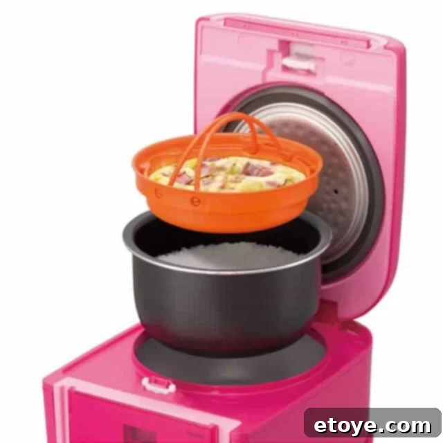 Win a Tiger JAJ-A55U Rice Cooker 2 Tiger JAJ-A55U Rice Cooker in pristine white finish