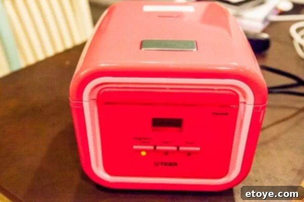 Win a Tiger JAJ-A55U Rice Cooker 4 Close-up of the Tiger JAJ-A55U rice cooker's control panel and sleek design