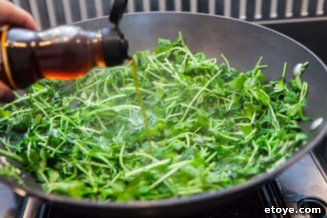 Garlic Stir-Fried Pea Shoots 7 Finished Chinese stir-fried pea shoots, perfectly wilted