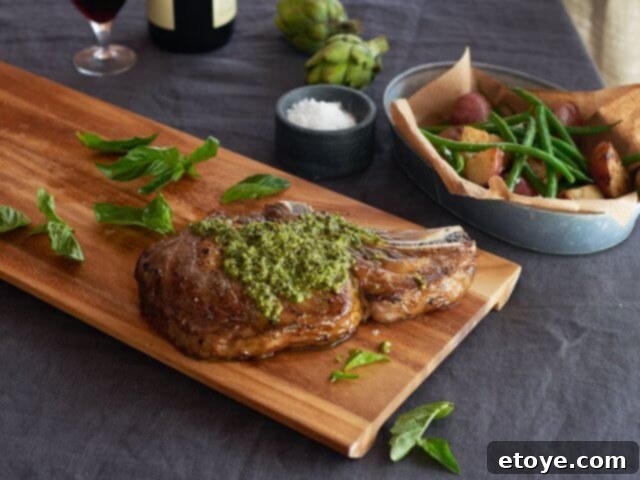 Three Bridges Weeknight Wonders: Our Review and a Giveaway! 4 Grilled steak topped with vibrant green Three Bridges Pesto, served on a plate.