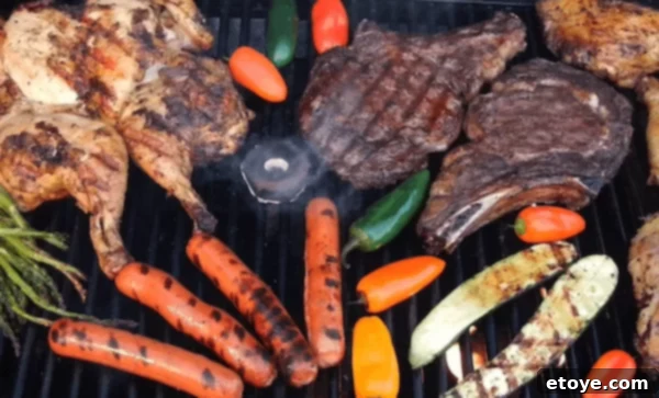 Win Big in the Smokin Os Grilling Giveaway 4 Gas grill filled with smoke from Smokin O's BBQ rings for enhanced flavor