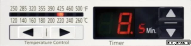 Close-up of Panasonic NB-G110PW FlashXpress Toaster Oven controls and display