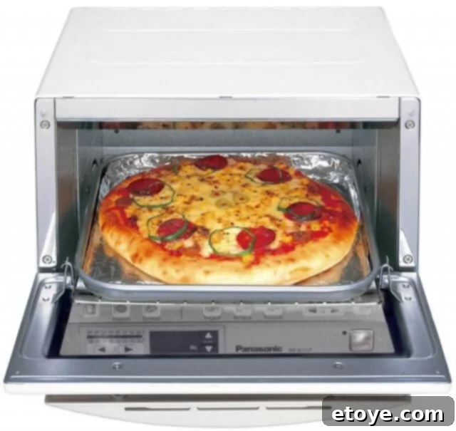 Panasonic NB-G110PW FlashXpress Toaster Oven in operation