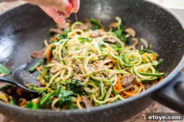 Korean Zucchini Noodle Recipe - Add Sesame Seeds Serving Korean Zucchini Noodles with Sesame Seeds