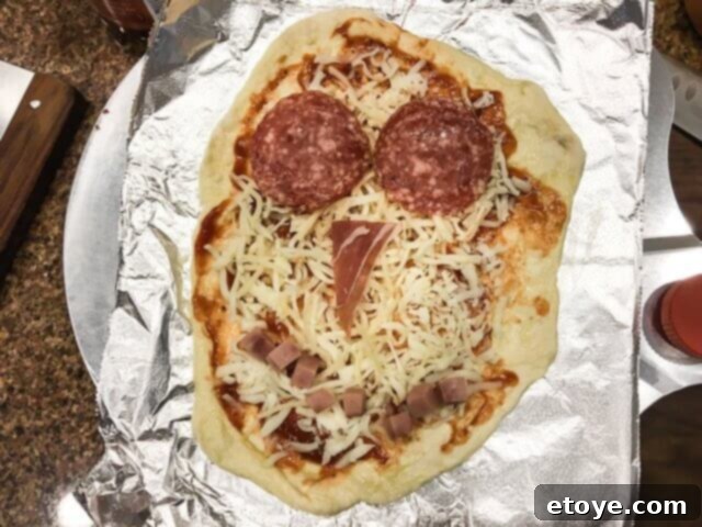 Pizzeria Pronto Stovetop Pizza Oven Review And Giveaway 5 Kids decorating their homemade pizza