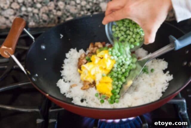 Adding Peas to Fried Rice chicken fried rice recipe - add peas