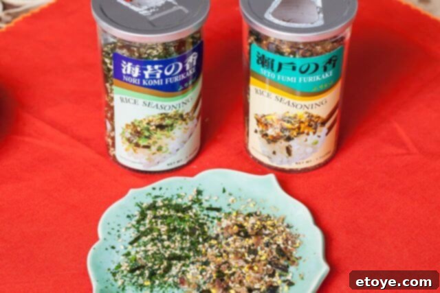 Bowl of Japanese furikake seasoning, with sesame seeds and seaweed flakes.