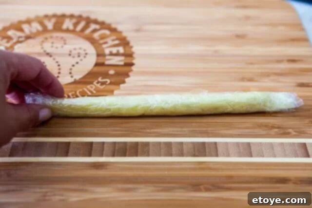 Making the Most of Leftover Ginger 11 A perfectly formed frozen ginger roll, neatly wrapped and ready for storage