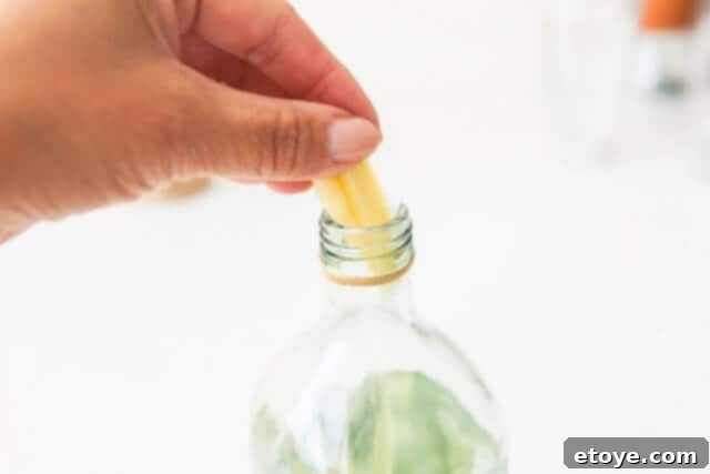 Making the Most of Leftover Ginger 3 Thinly sliced ginger infusing in a bottle of Chinese cooking wine