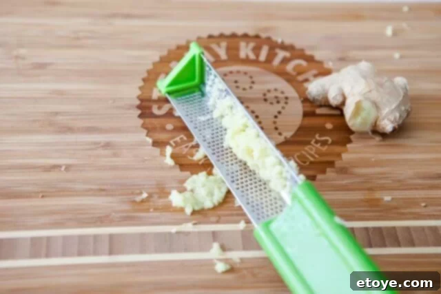 Making the Most of Leftover Ginger 7 Close-up showing the fibrous residue of ginger left behind on a microplane grater