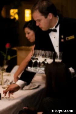 Two hands clinking sake glasses during a refined Japanese sake tasting