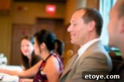 Pouring a delicate Japanese sake into a traditional tasting glass