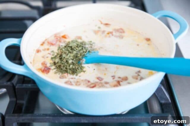 Leftover Turkey Tikka Masala 11 Adding coconut milk and fenugreek leaves