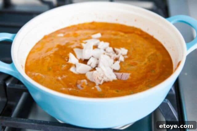 Leftover Turkey Tikka Masala 13 Adding cooked turkey to the Tikka Masala sauce