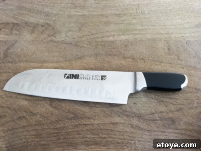Fini Santoku Knife: Dimpled blade for easy food release