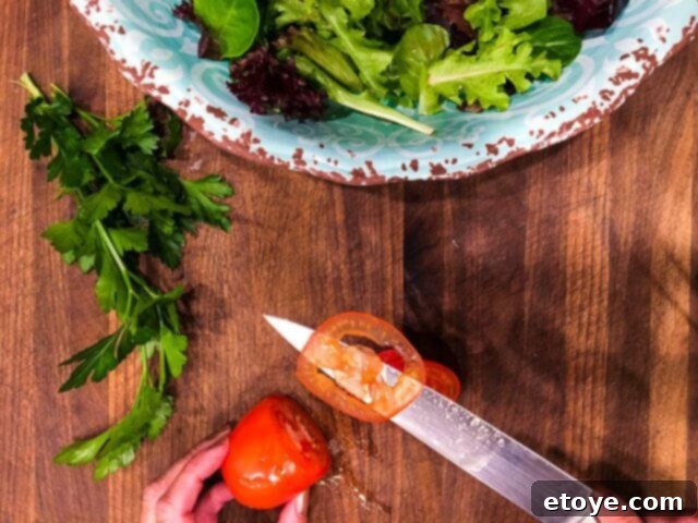 Wüsthof Classic Ikon 6-inch Utility Knife thin tomato slices