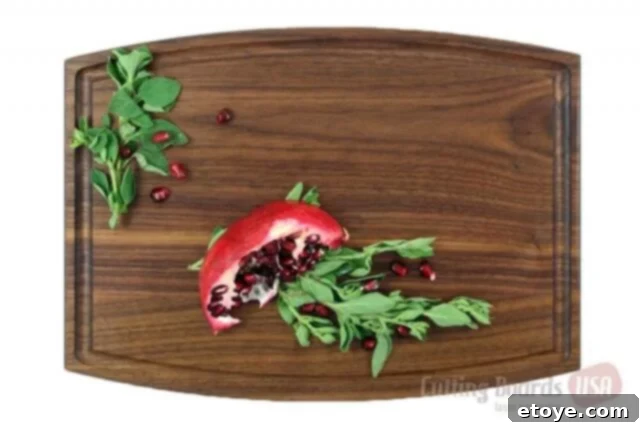 High-quality custom wooden cutting board with elegant engraving, perfect for kitchen use.