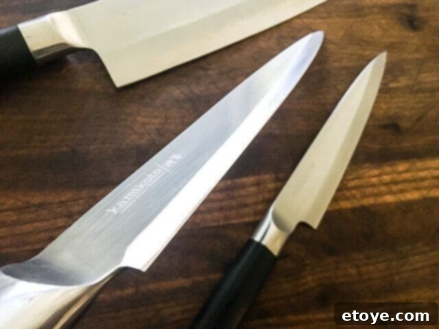 Kamikoto Knives Review and Giveaway 5 Kamikoto knife blade reflecting light