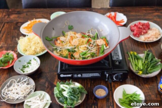 A freshly cooked bowl of homemade Mongolian BBQ, garnished and ready to be enjoyed.