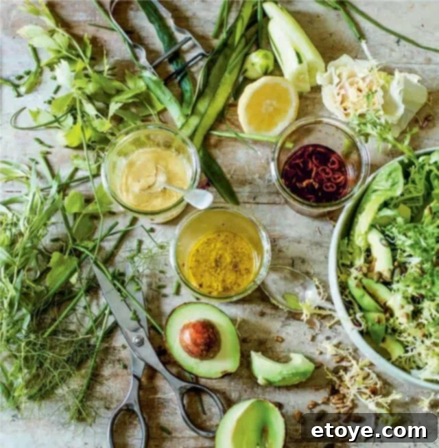 Assortment of vibrant homemade salad dressings in jars, showcasing herb, yogurt, mustard, and sesame soy varieties, ready for use on fresh salads.
