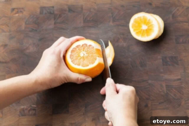 Grapefruit, Avocado and Baby Arugula Salad 4 Cutting peel and white pith from grapefruit