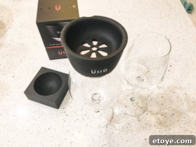 Wine Purifier Ends Hangovers and Headaches 10 Ullo Wine Purifier on a wine glass