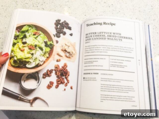 Open cookbook showing salad recipe