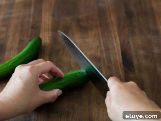 Hammer Stahl Chef's Knife slicing cucumbers