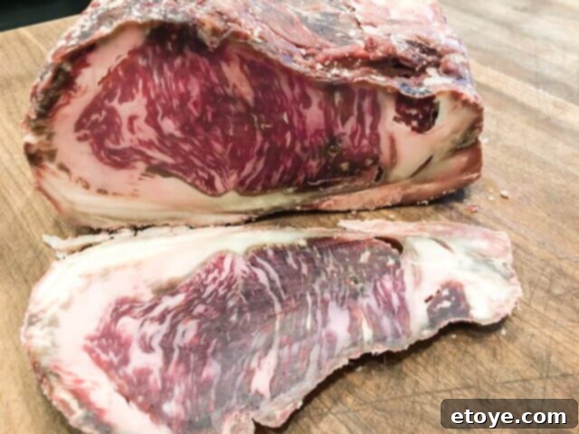 SteakAger Review Plus Win One 16 The cross-section of a dry-aged steak after the 'bark' has been trimmed, revealing the deep red, tender meat