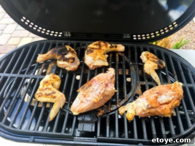 Perfectly seared steaks cooking on the STOK Gridiron Grill