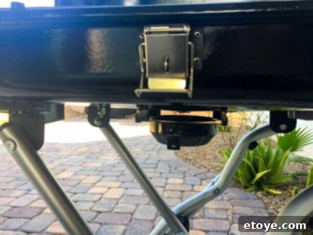 Removable grease catcher from the STOK Gridiron Grill, designed for easy cleanup