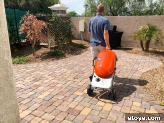 Close-up view of the STOK Gridiron Grill's large, sturdy wheels for easy rolling