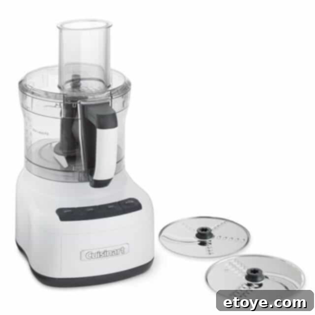 Various chopped and shredded ingredients from a Cuisinart food processor