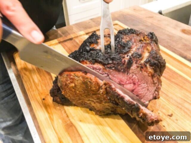 Win a Ronco 5250 EZ Store Rotisserie Oven 13 Slicing the succulent prime rib roast, showing its tender interior