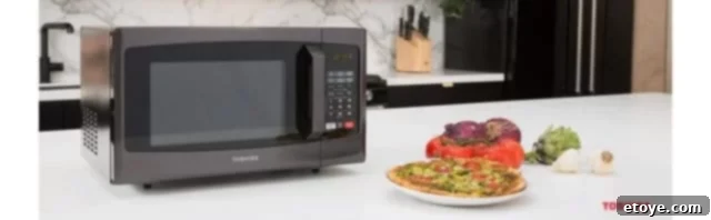 Toshiba 0.9 cu. ft. 900W Black Stainless Steel Microwave for modern kitchens