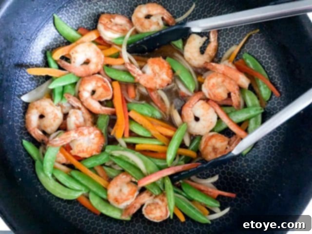 Shrimp Teriyaki Recipe stir fry Shrimp Teriyaki Recipe cooked and glossy stir fry, ready to serve