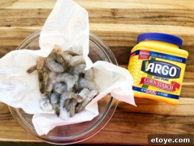 Shrimp Teriyaki Recipe cornstarch shrimp Shrimp Teriyaki Recipe preparing shrimp by patting dry and coating in cornstarch