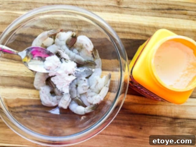 Shrimp Teriyaki Recipe cornstarch shrimp Shrimp Teriyaki Recipe tossing shrimp in cornstarch for a crispy coating